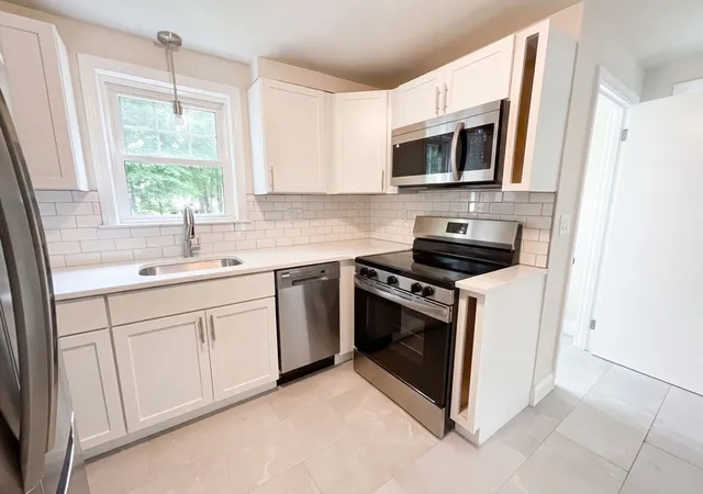 Photo 3 of Single family home for sale at 48 Woodlawn St, Randolph, MA 02368 | MLS# 73557023 | Listing updated on 2026-09-20