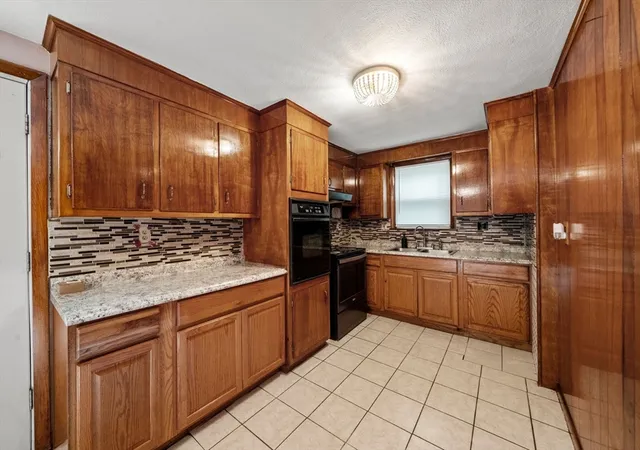 Photo 3 of Single family home for sale at 33 Cross St, Brockton, MA 02301 | MLS# 73563279 | Listing updated on 2026-09-19
