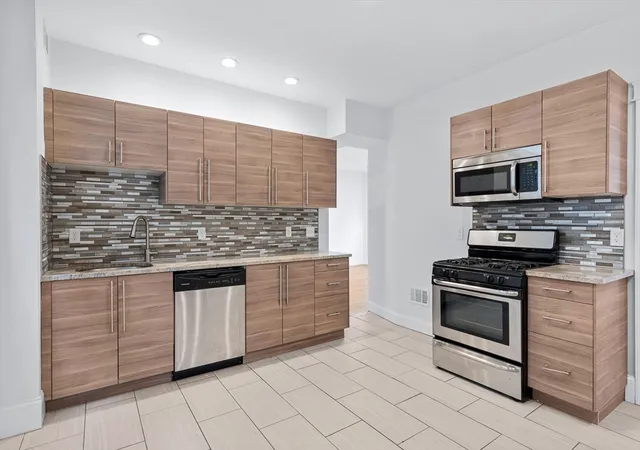 Photo 2 of Multi family home for sale at 8 Roach St, Dorchester, MA 02125 | MLS# 73541828 | Listing updated on 2026-09-01