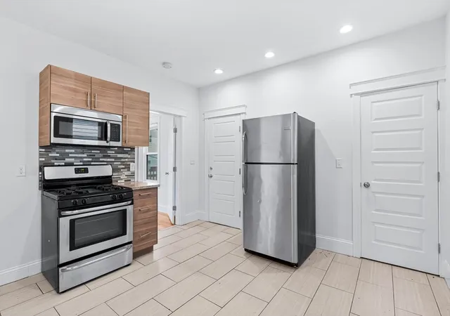 Photo 3 of Multi family home for sale at 8 Roach St, Dorchester, MA 02125 | MLS# 73541828 | Listing updated on 2026-09-01