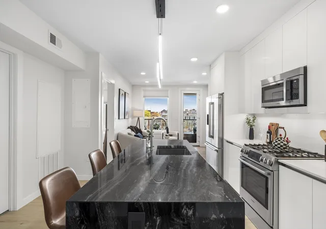 Photo 3 of Condo for sale at 2 Maverick Square #402, Boston, MA 02128 | MLS# 73569010 | Listing updated on 2026-08-31
