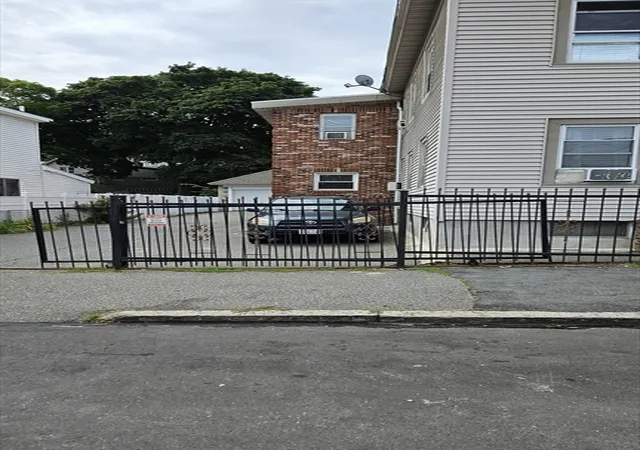 Photo 3 of Multi family home for sale at 12 Warren St, Lawrence, MA 01841 | MLS# 73570079 | Listing updated on 2026-09-07