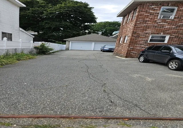 Photo 4 of Multi family home for sale at 12 Warren St, Lawrence, MA 01841 | MLS# 73570079 | Listing updated on 2026-09-07