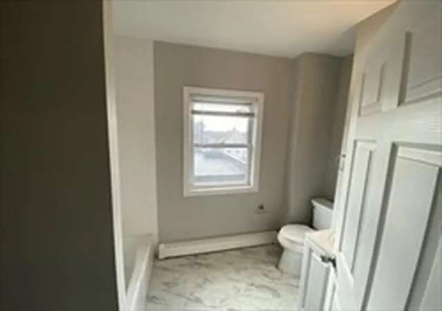 Photo 3 of Multi family home for sale at 9 Parker St, Chelsea, MA 02150 | MLS# 73570203 | Listing updated on 2026-10-09