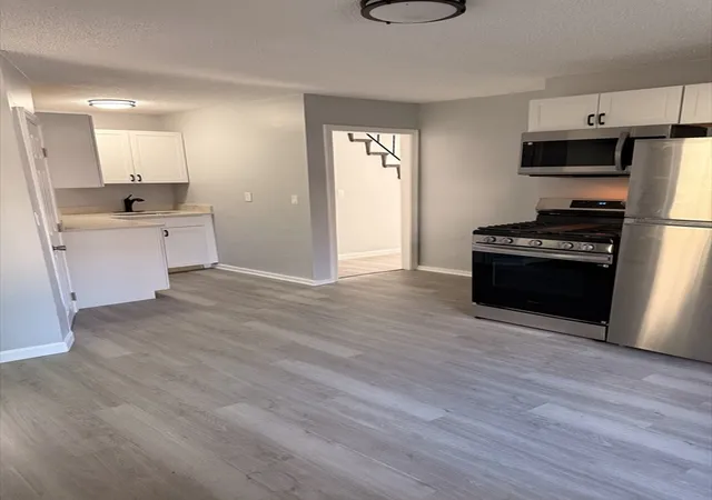 Photo 3 of Multi family home for sale at 1 3 Harrison Pl, Lowell, MA 01850 | MLS# 73569034 | Listing updated on 2026-09-18