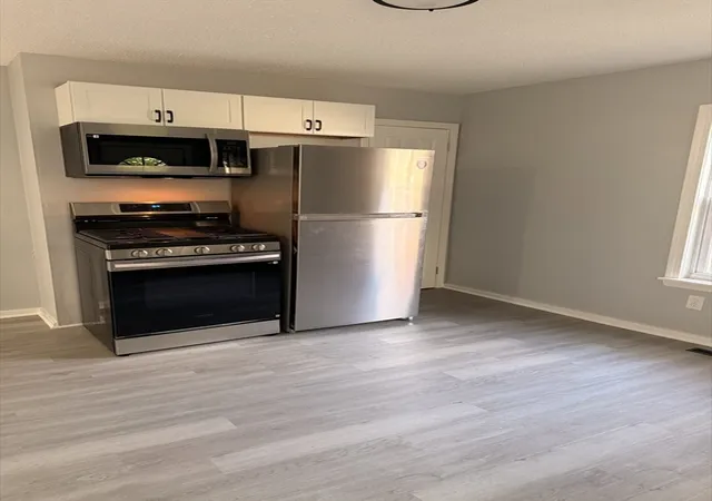 Photo 4 of Sale Pending at 1-3 Harrison Pl, Lowell, MA 01850 | MLS# 73569034 | Listing updated on 2026-09-30