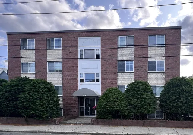 Condominium at 12 Woodland St #12, Everett, MA 02149 | MLS# 73383809 | | Sold on 2025-12-10
