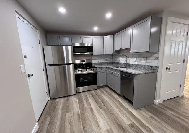 Photo 1 of Condominium at 12 Woodland St #12, Everett, MA 02149 | MLS# 73383809 | | Sold on 2025-12-10