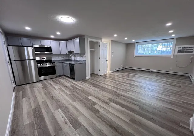 Photo 2 of Condominium at 12 Woodland St #12, Everett, MA 02149 | MLS# 73383809 | | Sold on 2025-12-10