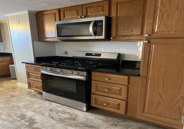 Photo 4 of Multi family home for sale at 40-44 Forest St, Methuen, MA 01844 | MLS# 73569939 | Listing updated on 2026-09-09