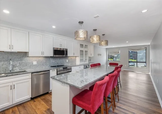 1st image of 100 Ledgewood Dr #410, Stoneham, MA 02180 | MLS# 73553957