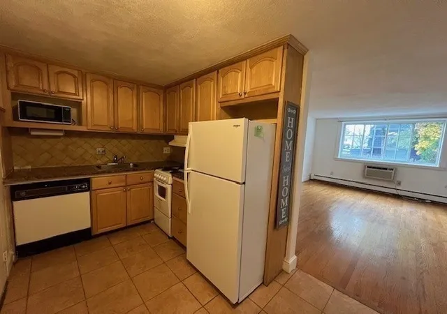 Photo 2 of Condominium at 12 Woodland St #26, Everett, MA 02149 | MLS# 73311274 | | Sold on 2025-01-07