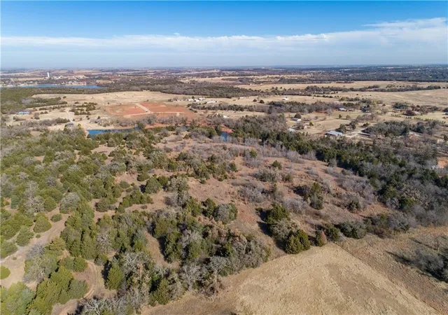Photo 3 of Land for sale at 1550 Bird Creek Dr, Guthrie, OK 73044 | MLS# 1002475 | Listing updated on 2026-03-24