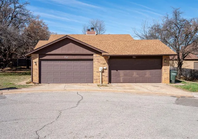 1st image of 703 Stonecroft Cir #701 & 703, Edmond, OK 73034 | MLS# 1213218