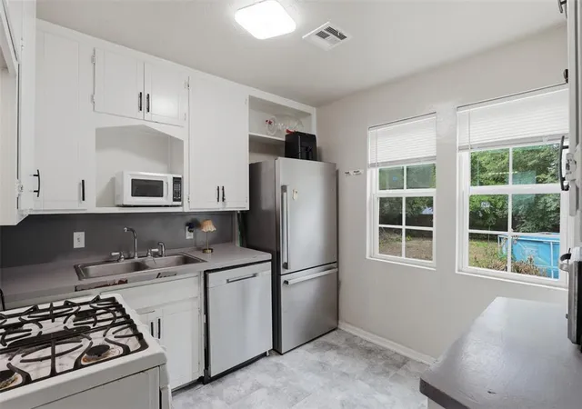 image of 702 Tollie Dr, Norman, OK 73071 | MLS# 1231323