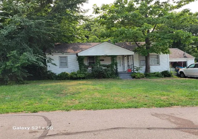 1st image of 1413 Magnolia Ln, Midwest City, OK 73110 | MLS# 1236665