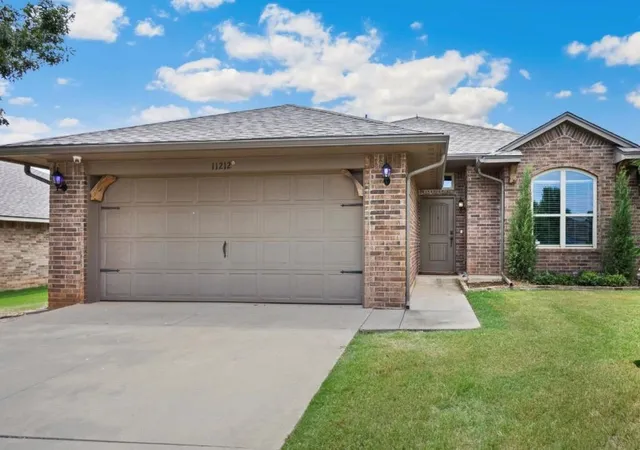 Photo 1 of Single family home for sale at 11212 Nw 100th Street, Yukon, OK 73099 | MLS# 1239030 | Listing updated on 2026-10-07