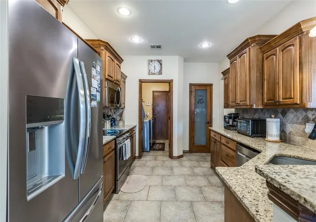 Photo 4 of Single family home for sale at 11240 NW 104th Street, Yukon, OK 73099 | MLS# 1240133 | Listing updated on 2026-09-08