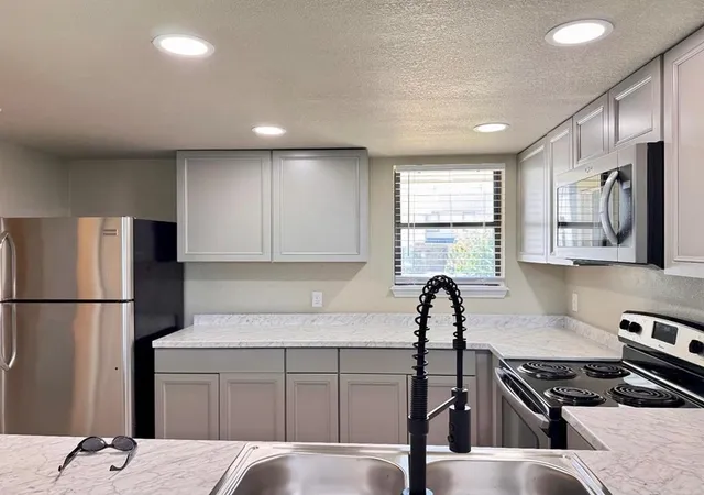 Photo 3 of Townhouse for sale at 417 NE 115th Street, Oklahoma City, OK 73114 | MLS# 1240448 | Listing updated on 2026-09-03