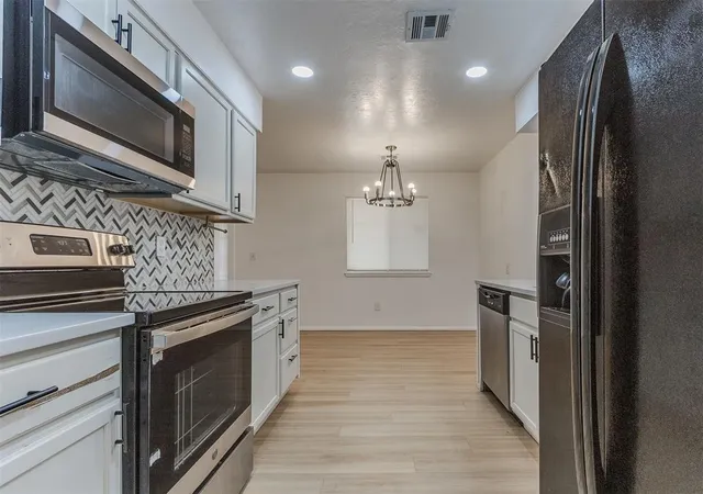 Photo 3 of Single family home for sale at 405 Woodland Dr, Oklahoma City, OK 73130 | MLS# 1250492 | Listing updated on 2026-10-06