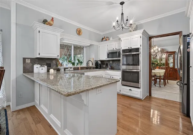 Photo 4 of Single family home for sale at 4100 NW 144th Terrace, Oklahoma City, OK 73134 | MLS# 1252591 | Listing updated on 2026-10-08
