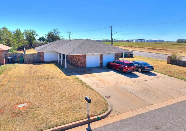 Photo 2 of Multi family home for sale at 7026 Woodlake Dr, Oklahoma City, OK 73132 | MLS# 1255987 | Listing updated on 2026-10-29