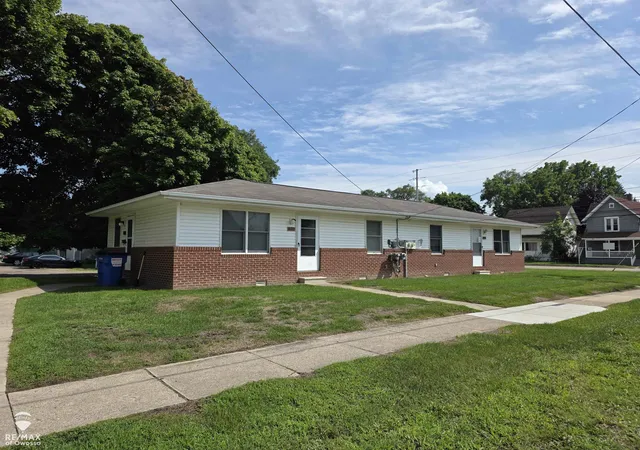 1st image of 801 803 Corunna Ave, Owosso, MI 48867 | MLS# 50219461