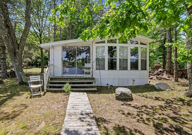 Photo 3 of Single Family Residence at 7870 W Village Rd, Mears, MI 49436 | MLS# 70539262 | | Sold on 2026-06-25