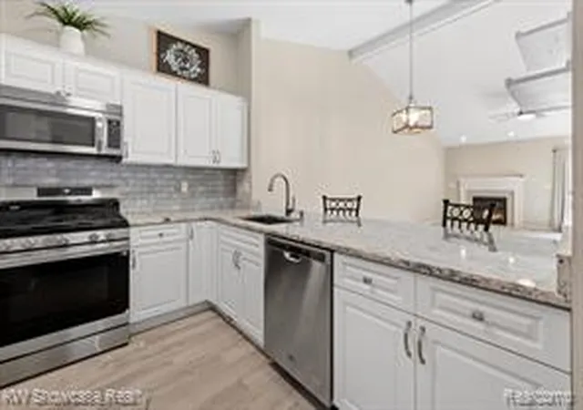Homes for sale in Ypsilanti, MI | 1873 N Kenwyck Dr, Ypsilanti, MI 48198 3295
