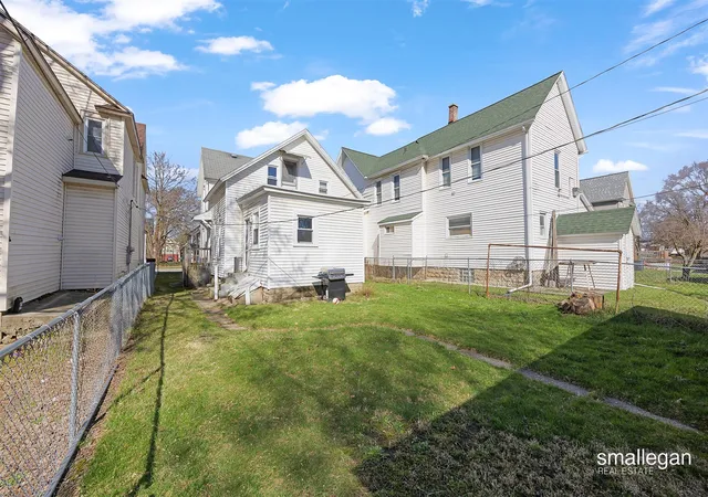 Photo 2 of Multi family home for sale at 1010 Nw Alpine Ave, Grand Rapids, MI 49504 | MLS# 70552440 | Listing updated on 2026-08-14