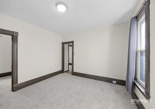 Photo 3 of Multi family home for sale at 1010 Nw Alpine Ave, Grand Rapids, MI 49504 | MLS# 70552440 | Listing updated on 2026-08-14
