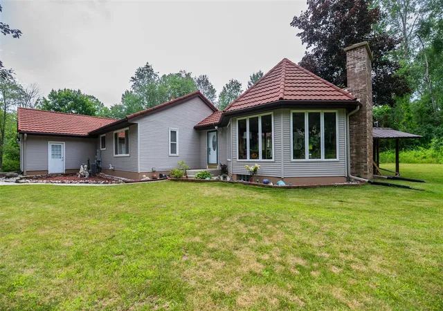 Homes for sale in Ada, MI | 989 Ne Mccabe Ave, Ada, MI 49301 | MLS# 70542697