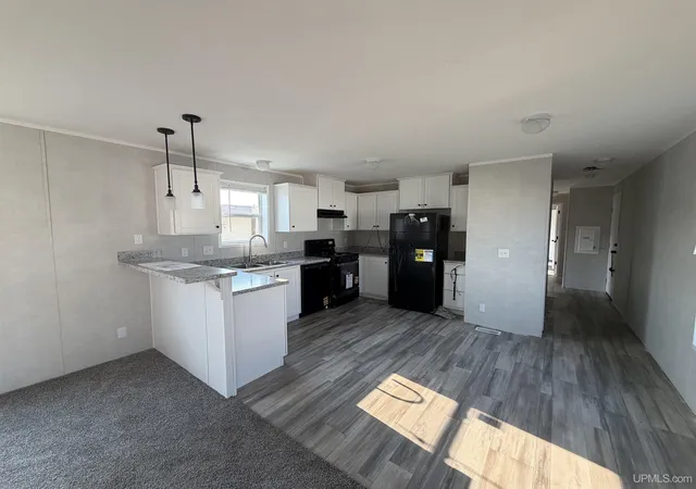 Photo 2 of Manufactured home for sale at 55 E Riling St, Gwinn, MI 49841 | MLS# 50215149 | Listing updated on 2026-08-18