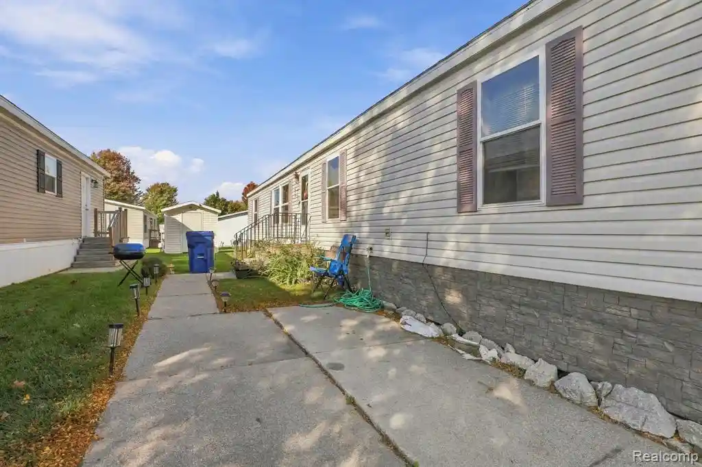 Photo 1 of Manufactured home for sale at 1220 Briar Downs Ln, Burton, MI 48529 | MLS# 61039893 | Listing updated on 2026-10-23
