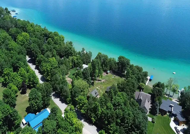 Homes for sale in Kewadin, MI | 7079 Torch Lake Drive,Nw, Kewadin, MI 49648 | MLS# 80055959