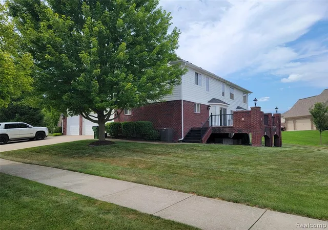 Photo 2 of Single family home for sale at 55958 Ashbrooke Dr, Shelby Township, MI 48316 | MLS# 61016628 | Listing updated on 2026-09-06