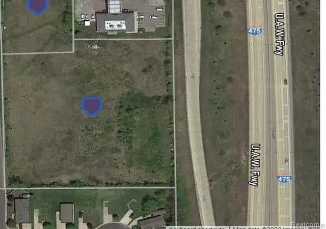 Photo 3 of Land for sale at Vacant Green Briar Boulevard, Burton, MI 48529 | MLS# 60287660 | Listing updated on 2025-12-15