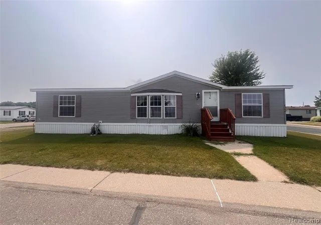 Photo 1 of Manufactured home for sale at 8304 Hidden Holw, Fenton, MI 48430 | MLS# 61021242 | Listing updated on 2026-10-08