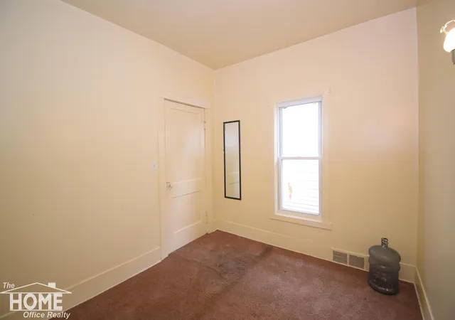 Listing Photo 2 - Condo for sale in building located at 609 Broadway Ave, Owosso, MI 48867 - Unit #