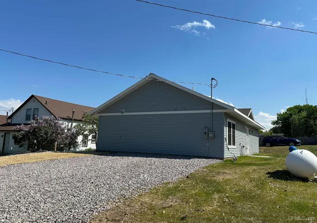 Photo 3 of Single family home for sale at 104 Schneider Ave, Big Bay, MI 49808 | MLS# 50195019 | Listing updated on 2026-09-16