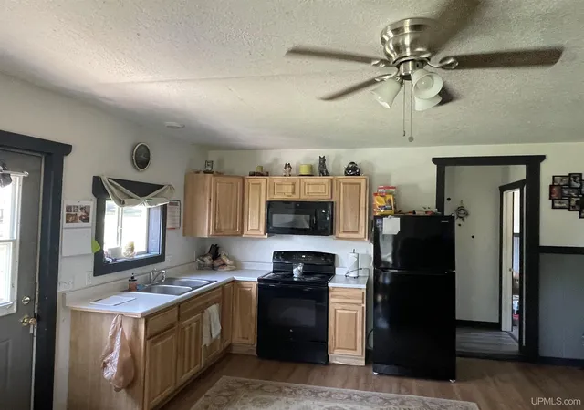 Photo 3 of Single family home for sale at 100 Carpenter Ave, Iron Mountain, MI 49801 | MLS# 50216331 | Listing updated on 2026-08-04