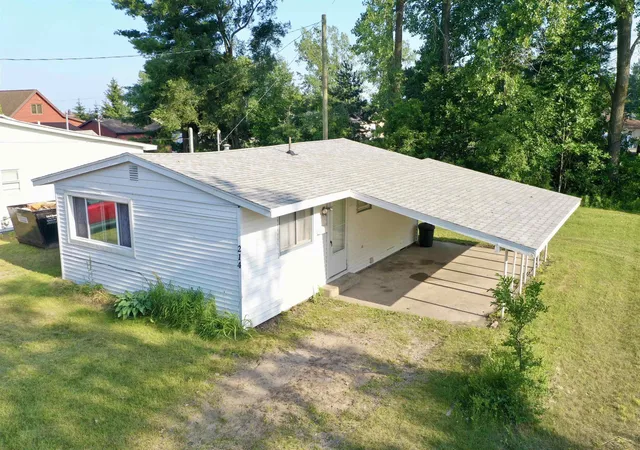 Homes for sale in Oscoda, MI | 214 E Division Ave, Oscoda, MI 48750 | MLS# 50214339