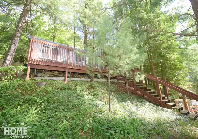2nd image of 1121 & 1131 Lake Dr, Harrison, MI 48625 | MLS# 50213339