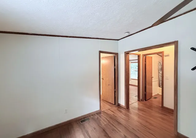 3rd image of 129 Pinecrest Dr, Beulah, MI 49617 | MLS# 80072570