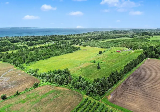 1st image of 000 Coleman Rd, Kewadin, MI 49648 | MLS# 80066001
