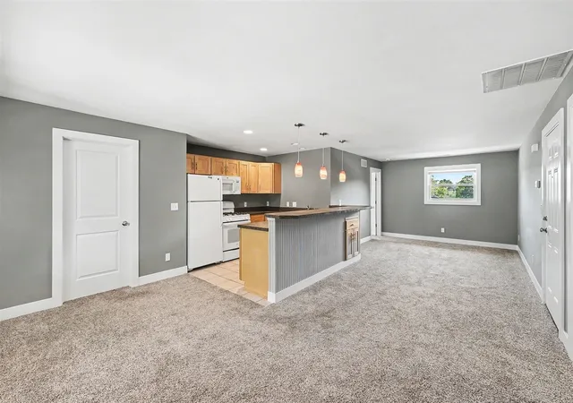Photo 3 of Multi family home for sale at 823 Benson Ave, Grand Rapids, MI 49503 | MLS# 70544279 | Listing updated on 2026-10-06