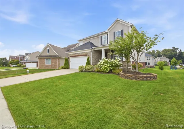 Photo 3 of Single family home for sale at 57909 Cider Ml Dr, New Hudson, MI 48165 | MLS# 61022130 | Listing updated on 2026-08-30