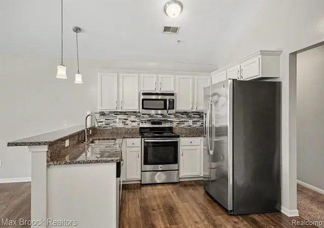 Photo 4 of Condo for sale at 49086 W Woods Dr, Utica, MI 48317 1855 | MLS# 61024315 | Listing updated on 2026-09-18