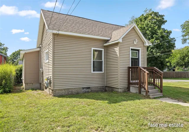 Photo 2 of Sale Pending at 703 Pearl St, Belding, MI 48809 | MLS# 70554680 | Listing updated on 2026-09-03