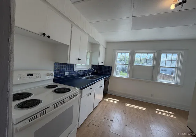 Photo 3 of Multi family home for sale at 509 S 1st Avenue, Escanaba, MI 49829 | MLS# 50210540 | Listing updated on 2026-09-11